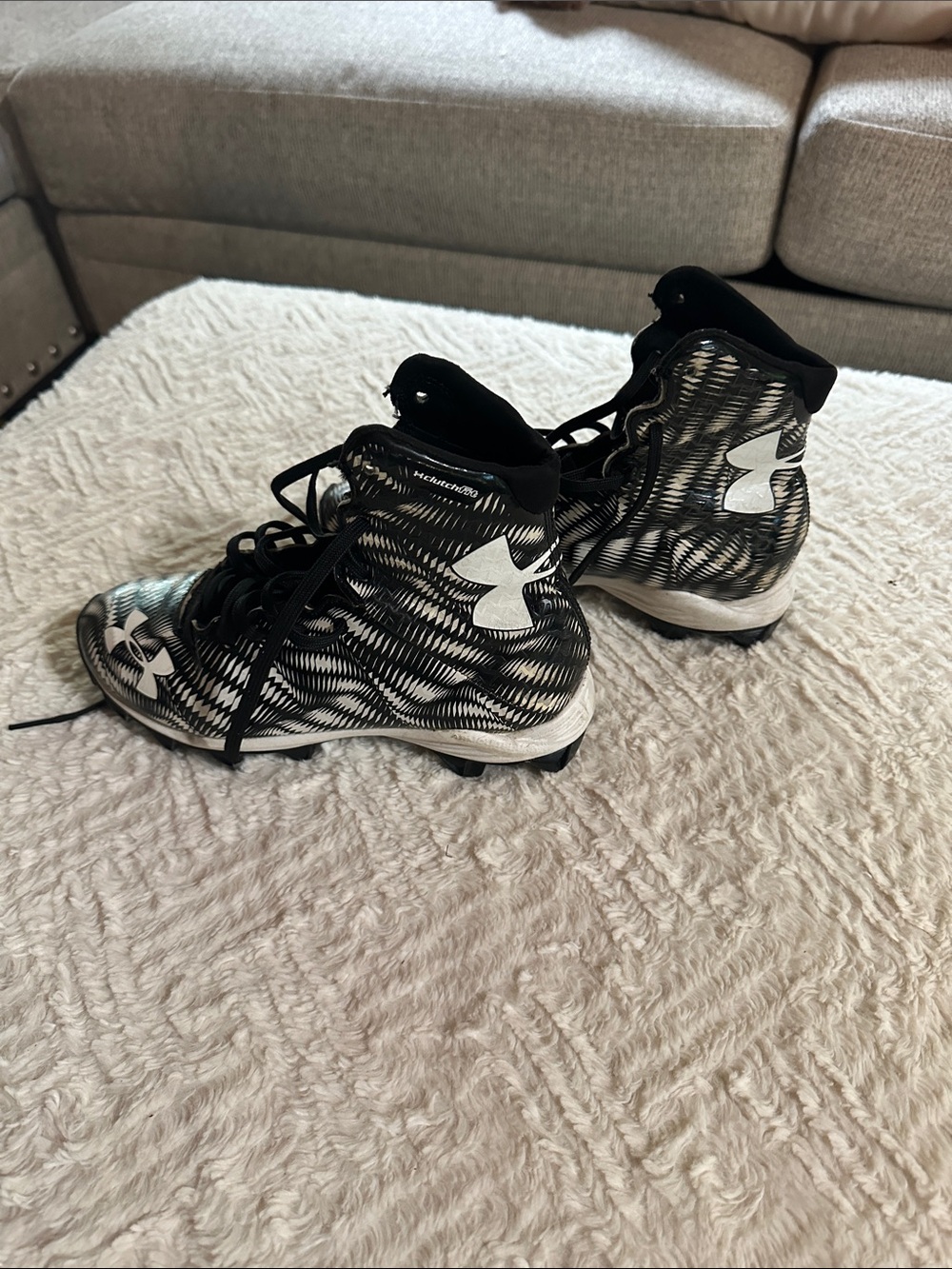 Under Armour Kids Black and White High-Top Football or Baseball Cleats